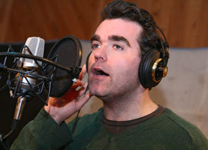 “In the booth at MSR Legacy Studios in NYC recording Shrek the Musical.”